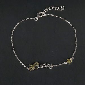 Green jeweled L “Lucky” Charm Bracelet